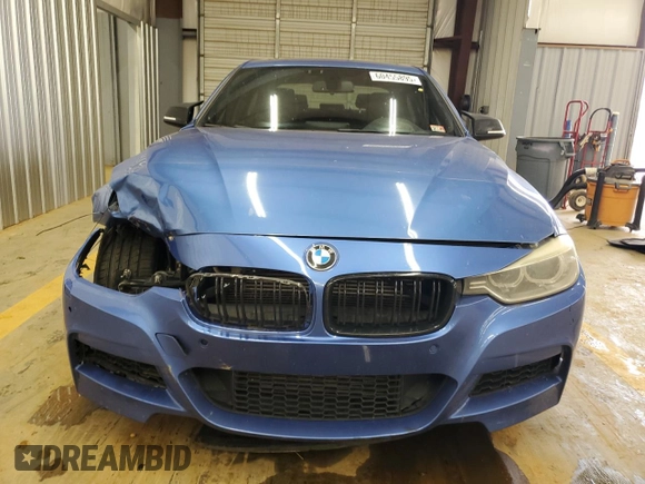 2013 BMW 3 Series 335i xDrive with VIN WBA3B9C59DJ899246, listed as a Copart auction lot 60455895 with 193,104 mi miles and Salvage title. Bid and sale history available at DreamBid. Image 5.