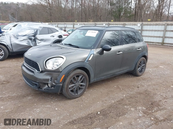 2014 MINI Countryman S with VIN WMWZC3C55EWT00349, listed as a IAAI auction lot 41738181 with 133,662 mi miles and . Bid and sale history available at DreamBid. Image 2.