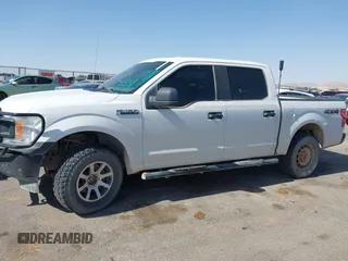 2018 Ford F-150 XL with VIN 1FTEW1E53JKE93841, listed as a IAAI auction lot 42256829 with 126,192 mi miles and . Bid and sale history available at DreamBid. Image 14.