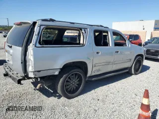 2013 Chevrolet Suburban LT with VIN 1GNSCJE05DR371789, listed as a Copart auction lot 60755775 with 233,275 mi miles and Salvage title. Bid and sale history available at DreamBid. Image 3.