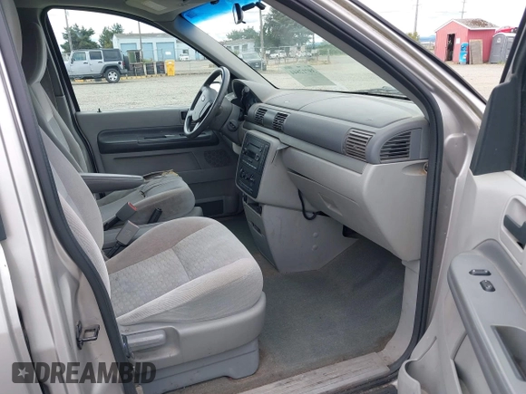 2004 Ford Freestar SE z VIN 2FMZA51664BA73569, wystawiony jako IAAI lot #39712844 z przebiegiem 182 013 mil mil oraz . Historia ofert i sprzedaży dostępna na DreamBid. Obrazek 5.