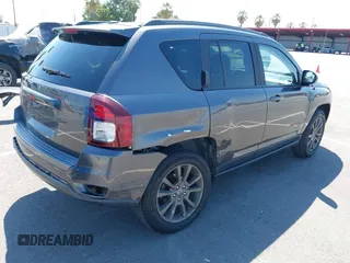 2016 Jeep Compass Sport SE z VIN 1C4NJDBBXGD729747, wystawiony jako IAAI lot #42642509 z przebiegiem 157 774 mil mil oraz . Historia ofert i sprzedaży dostępna na DreamBid. Obrazek 4.