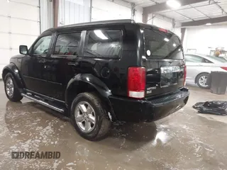 2007 Dodge Nitro SLT with VIN 1D8GT58K77W724530, listed as a IAAI auction lot 41499022 with 214,183 mi miles. Bid and sale history available at carsss.com. Image 3.