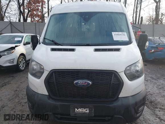 2021 Ford Transit Cargo with VIN 1FTBR2C82MKA29523, listed as a IAAI auction lot 41069336 with 195,397 mi miles and . Bid and sale history available at DreamBid. Image 12.