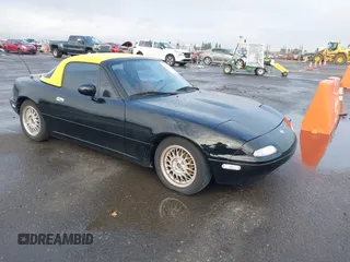 1992 Mazda MX-5 Miata z VIN JM1NA3510N0320738, wystawiony jako IAAI lot #41079887 z przebiegiem 153 090 mil mil oraz . Historia ofert i sprzedaży dostępna na DreamBid. Obrazek 1.