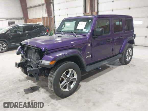 2023 Jeep Wrangler Sahara with VIN 1C4HJXEN9PW560958, listed as a IAAI auction lot 41980179 with 35,975 mi miles and . Bid and sale history available at DreamBid. Image 2.