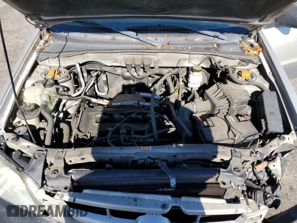 2005 Mazda Tribute i with VIN 4F2YZ02Z85KM31234, listed as a Copart auction lot 68669434 with 211,921 mi miles and Salvage Title. Bid and sale history available at carsss.com. Image 12.