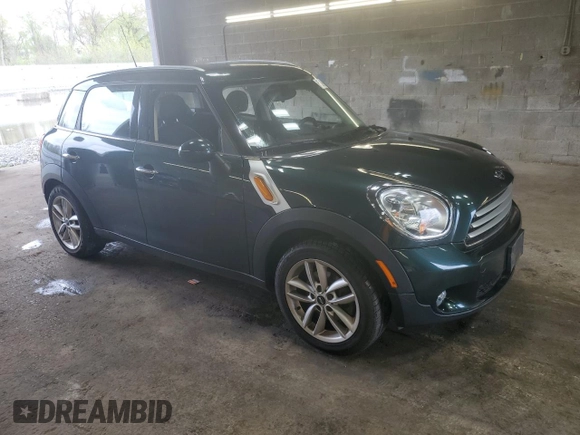 2014 MINI Countryman with VIN WMWZB3C58EWR37237, listed as a Copart auction lot 55596935 with 127,458 mi miles and Salvage Title. Bid and sale history available at DreamBid. Image 4.