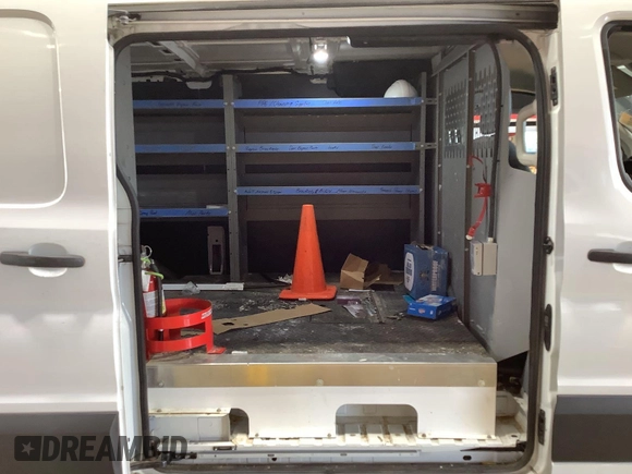 2019 Ford Transit with VIN 1FTYE1YM4KKB86909, listed as a IAAI auction lot 42749952 with 113,691 mi miles and . Bid and sale history available at DreamBid. Image 3.