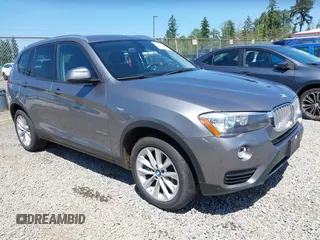 2016 BMW X3 xDrive28i z VIN 5UXWX9C58G0D79598, wystawiony jako IAAI lot #42443477 z przebiegiem 77 758 mil mil oraz . Historia ofert i sprzedaży dostępna na DreamBid. Obrazek 1.