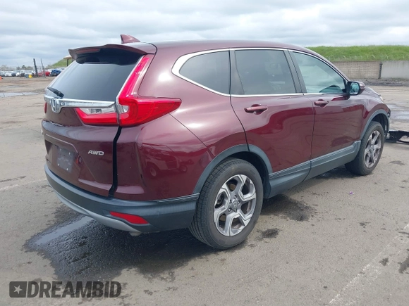 2019 Honda CR-V EX with VIN 7FARW2H56KE053022, listed as a IAAI auction lot 41848570 with 128,676 mi miles. Bid and sale history available at carsss.com. Image 4.