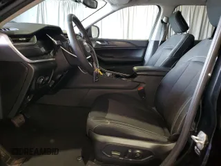 2023 Jeep Grand Cherokee Laredo with VIN 1C4RJHAG7P8866871, listed as a Copart auction lot 58341235 with 48,737 mi miles and Salvage title. Bid and sale history available at DreamBid. Image 7.