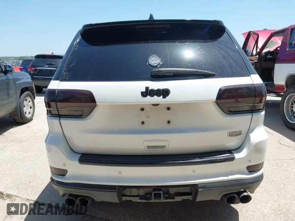 2015 Jeep Grand Cherokee Summit с VIN 1C4RJFJTXFC173287, выставлен на аукционе IAAI как лот 42794100 с пробегом 125 705 миль миль и . История ставок и продаж доступна на DreamBid. Изображение 16.
