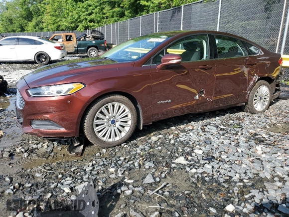 2016 Ford Fusion SE Hybrid z VIN 3FA6P0LU5GR377735, wystawiony jako Copart lot #58791955 z przebiegiem 135 798 mil mil oraz Szkoda całkowita • Salvage title. Historia ofert i sprzedaży dostępna na DreamBid. Obrazek 1.