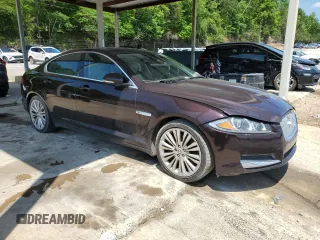 2012 Jaguar XF Portfolio with VIN SAJWA0HB9CLS50662, listed as a Copart auction lot 54734555 with 90,073 mi miles and Clean Title. Bid and sale history available at carsss.com. Image 4.