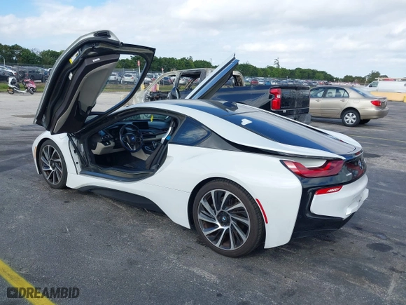 2015 BMW i8 with VIN WBY2Z2C51FV392661, listed as a IAAI auction lot 38409147 with 79,082 mi miles. Bid and sale history available at carsss.com. Image 3.