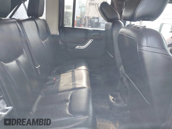 2017 Jeep Wrangler Unlimited Sahara with VIN 1C4BJWEG4HL518945, listed as a IAAI auction lot 42423505 with 155,828 mi miles and . Bid and sale history available at DreamBid. Image 8.