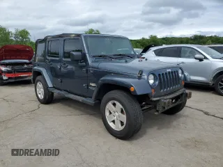 2008 Jeep Wrangler Unlimited Sahara with VIN 1J4GA59108L562831, listed as a Copart auction lot 58949225 with 206,312 mi miles and Clean title. Bid and sale history available at DreamBid. Image 4.