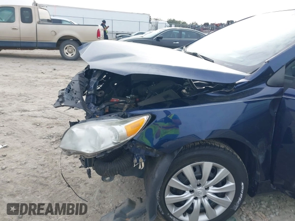 2012 Toyota Corolla L with VIN 5YFBU4EE6CP030641, listed as a IAAI auction lot 41864311 with 102,000 mi miles. Bid and sale history available at carsss.com. Image 6.