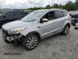 2017 Ford Escape Titanium with VIN 1FMCU0J96HUC12822, listed as a Copart auction lot 54259375 with 127,114 mi miles and Salvage Title. Bid and sale history available at DreamBid. Image 1.