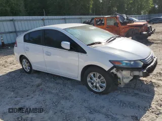 2010 Honda Insight EX z VIN JHMZE2H77AS035113, wystawiony jako Copart lot #54179005 z przebiegiem 165 083 mil mil oraz Szkoda całkowita • Salvage title. Historia ofert i sprzedaży dostępna na DreamBid. Obrazek 4.