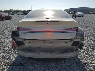 2016 Lincoln MKZ z VIN 3LN6L2G93GR615052, wystawiony jako Copart lot #54717335 z przebiegiem 86 575 mil mil oraz Szkoda całkowita • Salvage title. Historia ofert i sprzedaży dostępna na DreamBid. Obrazek 6.