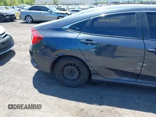 2020 Honda Civic LX z VIN 2HGFC2F61LH567246, wystawiony jako IAAI lot #42290361 z przebiegiem 50 388 mil mil oraz . Historia ofert i sprzedaży dostępna na DreamBid. Obrazek 17.