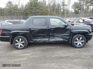 2014 Honda Ridgeline SE with VIN 5FPYK1F66EB005881, listed as a IAAI auction lot 41977349 with 184,567 mi miles. Bid and sale history available at carsss.com. Image 13.