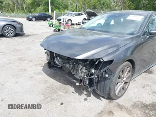 2020 Mazda 3 Select z VIN 3MZBPACL9LM127098, wystawiony jako IAAI lot #41948541 z przebiegiem 67 431 mil mil oraz . Historia ofert i sprzedaży dostępna na DreamBid. Obrazek 17.
