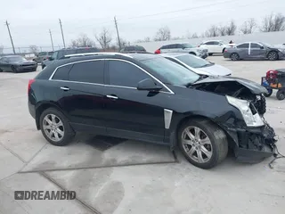 2015 Cadillac SRX Premium Collection z VIN 3GYFNDE3XFS576695, wystawiony jako IAAI lot #41612836 z przebiegiem Nie podano mil oraz . Historia ofert i sprzedaży dostępna na DreamBid. Obrazek 13.