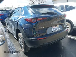 2023 Mazda CX-30 S with VIN 3MVDMBAM9PM541315, listed as a IAAI auction lot 41758162 with 46,296 mi miles and . Bid and sale history available at carsss.com. Image 3.