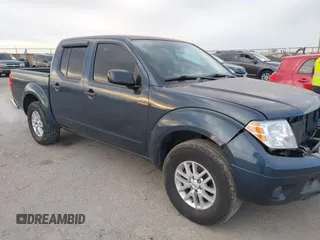 2019 Nissan Frontier SV z VIN 1N6AD0ER7KN883551, wystawiony jako IAAI lot #41227766 z przebiegiem 109 358 mil mil oraz . Historia ofert i sprzedaży dostępna na DreamBid. Obrazek 1.