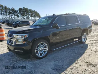 2019 Chevrolet Suburban Premier with VIN 1GNSKJKJXKR323704, listed as a Copart auction lot 72757214 with 150,404 mi miles and Salvage Title. Bid and sale history available at DreamBid. Image 1.