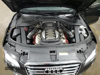 2011 Audi A8 z VIN WAURVAFD8BN005569, wystawiony jako Copart lot #52101065 z przebiegiem 104 893 mil mil oraz Szkody całkowita. Historia ofert i sprzedaży dostępna na DreamBid. Obrazek 11.