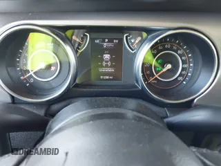 2020 Jeep Wrangler Sport S with VIN 1C4GJXAN5LW146068, listed as a IAAI auction lot 42071619 with 51,238 mi miles and . Bid and sale history available at DreamBid. Image 7.