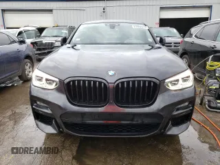 2021 BMW X4 M40i with VIN 5UX2V5C08M9E17162, listed as a Copart auction lot 67602073 with 33,879 mi miles. Bid and sale history available at carsss.com. Image 5.