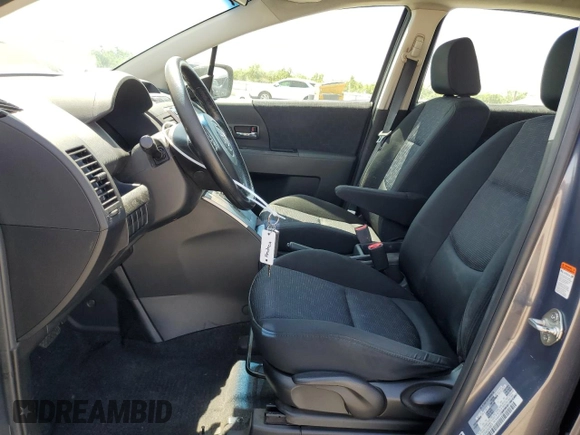 2010 Mazda 5 Sport with VIN JM1CR2WL6A0368572, listed as a Copart auction lot 62604545 with 84,537 mi miles and Salvage title. Bid and sale history available at DreamBid. Image 7.
