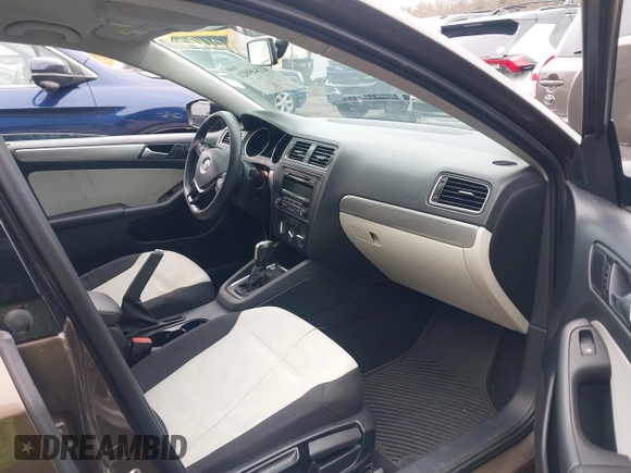 2015 Volkswagen Jetta Sedan 1.8T SE with VIN 3VWD17AJ2FM403107, listed as a IAAI auction lot 41849921 with 103,990 mi miles. Bid and sale history available at carsss.com. Image 5.