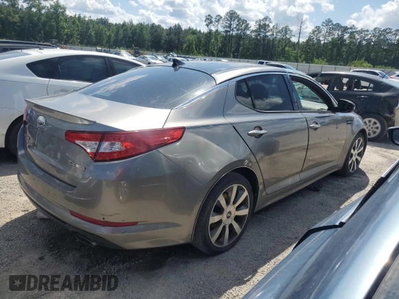2013 Kia Optima SX с VIN 5XXGR4A6XDG248081, выставлен на аукционе Copart как лот 55997735 с пробегом 122 088 миль миль и Списание • Salvage title. История ставок и продаж доступна на DreamBid. Изображение 3.
