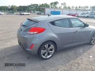 2013 Hyundai Veloster w/Gray Int with VIN KMHTC6AD3DU118515, listed as a IAAI auction lot 42336158 with 109,563 mi miles and . Bid and sale history available at DreamBid. Image 4.