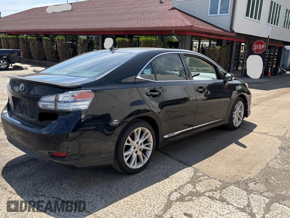 2010 Lexus HS 250h with VIN JTHBB1BA1A2020910, listed as a Copart auction lot 57009775 with 263,515 mi miles and Clean Title. Bid and sale history available at DreamBid. Image 4.