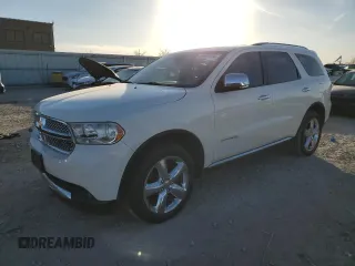 2012 Dodge Durango Citadel with VIN 1C4RDJEG6CC277973, listed as a Copart auction lot 84697374 with 331,621 mi miles and Salvage Title. Bid and sale history available at DreamBid. Image 1.