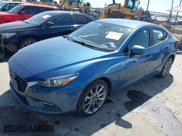 2018 Mazda 3 Touring with VIN 3MZBN1V38JM206827, listed as a IAAI auction lot 41983631 with 51,303 mi miles and . Bid and sale history available at DreamBid. Image 2.