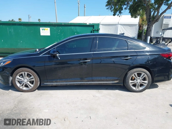 2018 Hyundai Sonata SEL with VIN 5NPE34AFXJH653446, listed as a IAAI auction lot 40011540 with 81,774 mi miles and . Bid and sale history available at DreamBid. Image 14.