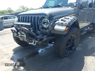 2022 Jeep Gladiator High Altitude with VIN 1C6HJTFG5NL149751, listed as a IAAI auction lot 42257917 with 24,603 mi miles and . Bid and sale history available at DreamBid. Image 6.