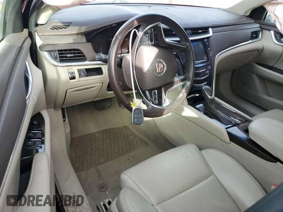 2014 Cadillac XTS z VIN 2G61L5S39E9300636, wystawiony jako Copart lot #78068634 z przebiegiem 117 549 mil mil oraz Szkody całkowita. Historia ofert i sprzedaży dostępna na DreamBid. Obrazek 8.