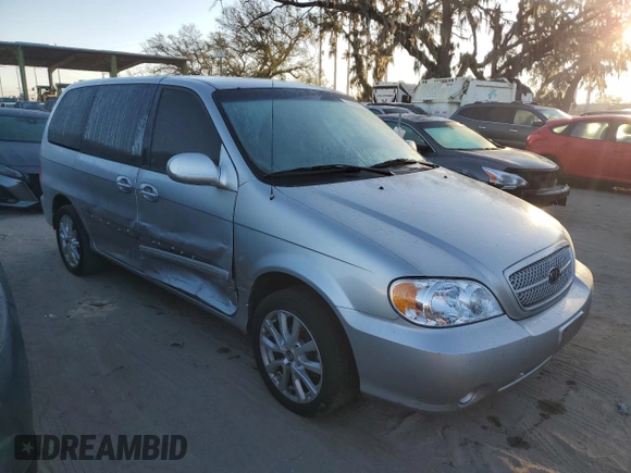 2004 Kia Sedona LX with VIN KNDUP131046591151, listed as a Copart auction lot 82201894 with 147,194 mi miles and Salvage Title. Bid and sale history available at carsss.com. Image 4.