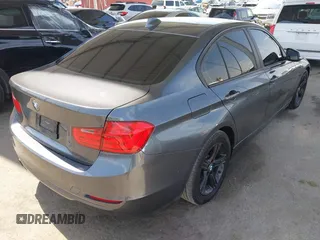 2015 BMW 3 Series 328i with VIN WBA3C1C56FK120073, listed as a IAAI auction lot 42571784 with 162,400 mi miles and . Bid and sale history available at DreamBid. Image 4.