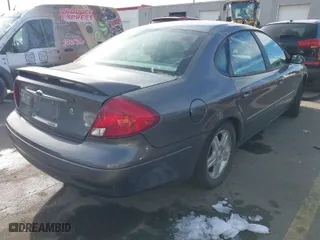 2002 Ford Taurus SEL with VIN 1FAFP56S52A207465, listed as a IAAI auction lot 41218559 with 170,003 mi miles. Bid and sale history available at carsss.com. Image 4.