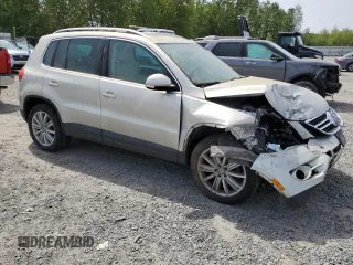 2011 Volkswagen Tiguan SEL z VIN WVGBV7AX6BW559854, wystawiony jako Copart lot #56268195 z przebiegiem 107 428 mil mil oraz Czysty tytuł • Clean title. Historia ofert i sprzedaży dostępna na DreamBid. Obrazek 4.
